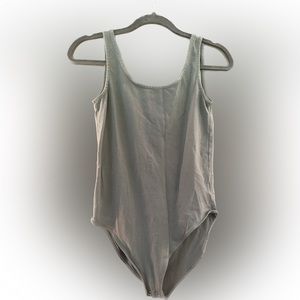 Form fitting GAP bodysuit
